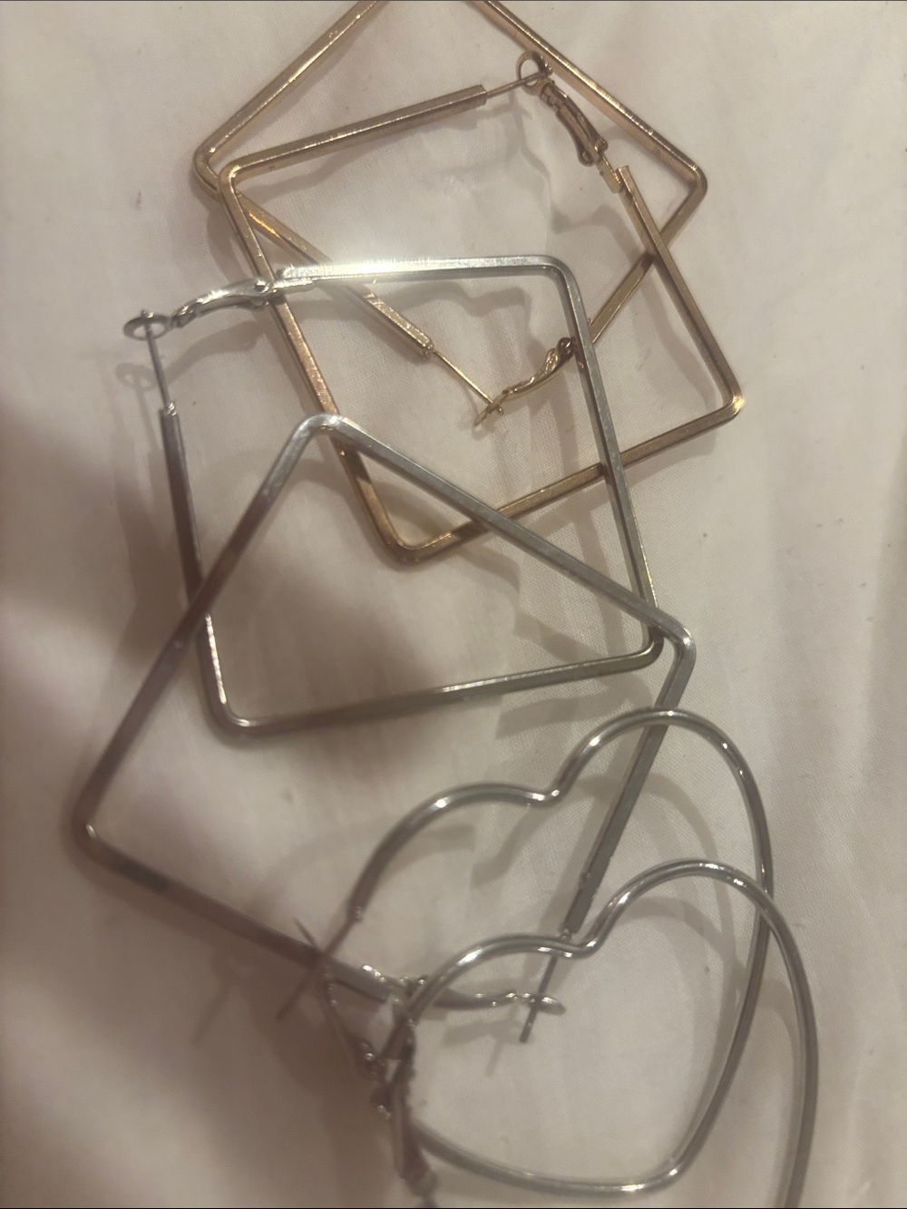 Three sets of earrings